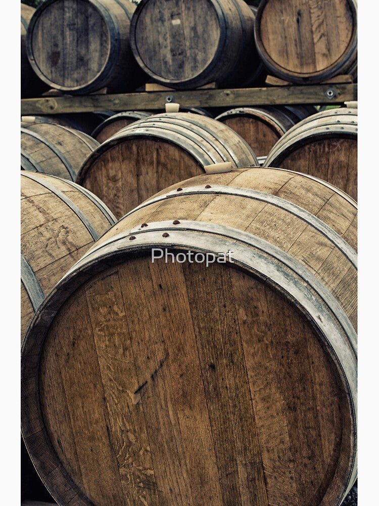 Wooden wine barrels by Photopat