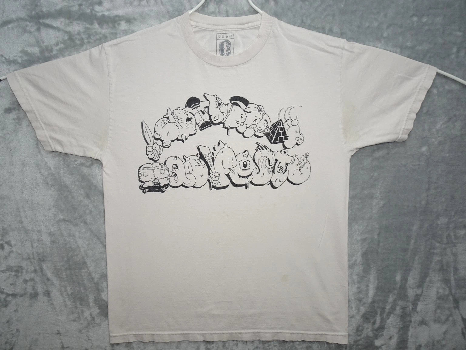 C.M. Urban Graffiti Cartoon Characters Large Beige T Shirt Graphic Print