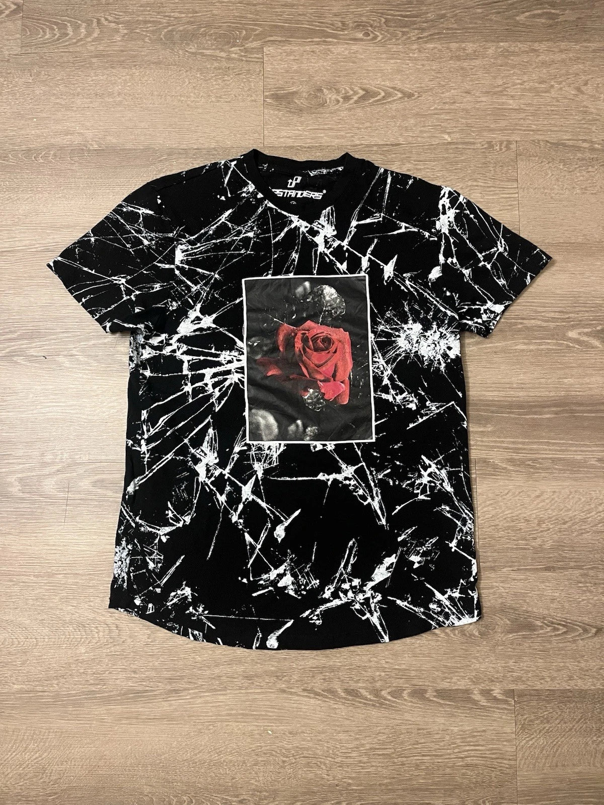 Rose graphic tee a perfect mix of streetwear edge and grunge aesthetic.